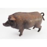 A late 19th / early 20th century cast-iron clockwork table-bell modelled as a sow (16 cm wide)