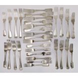 Thirty-one early to mid 19th century hallmarked silver serving and table forks: Old English,