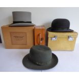 Three gents hats and two cases:  a grey top hat in its Gieves (27 Old Bond Street, London W1) box; a