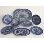 Eight good 19th century (including early 19th century) blue-and-white ceramic pieces comprising: a