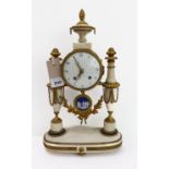 A 19th century gilt-metal-mounted and white marble eight-day French mantle clock: the white enamel