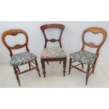 A pair of 19th century balloon back chairs with later floral upholstered seats, together with one