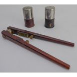 A 1960s or 1970s rosewood salt and pepper cruet-set and a set of similar period rosewood nut