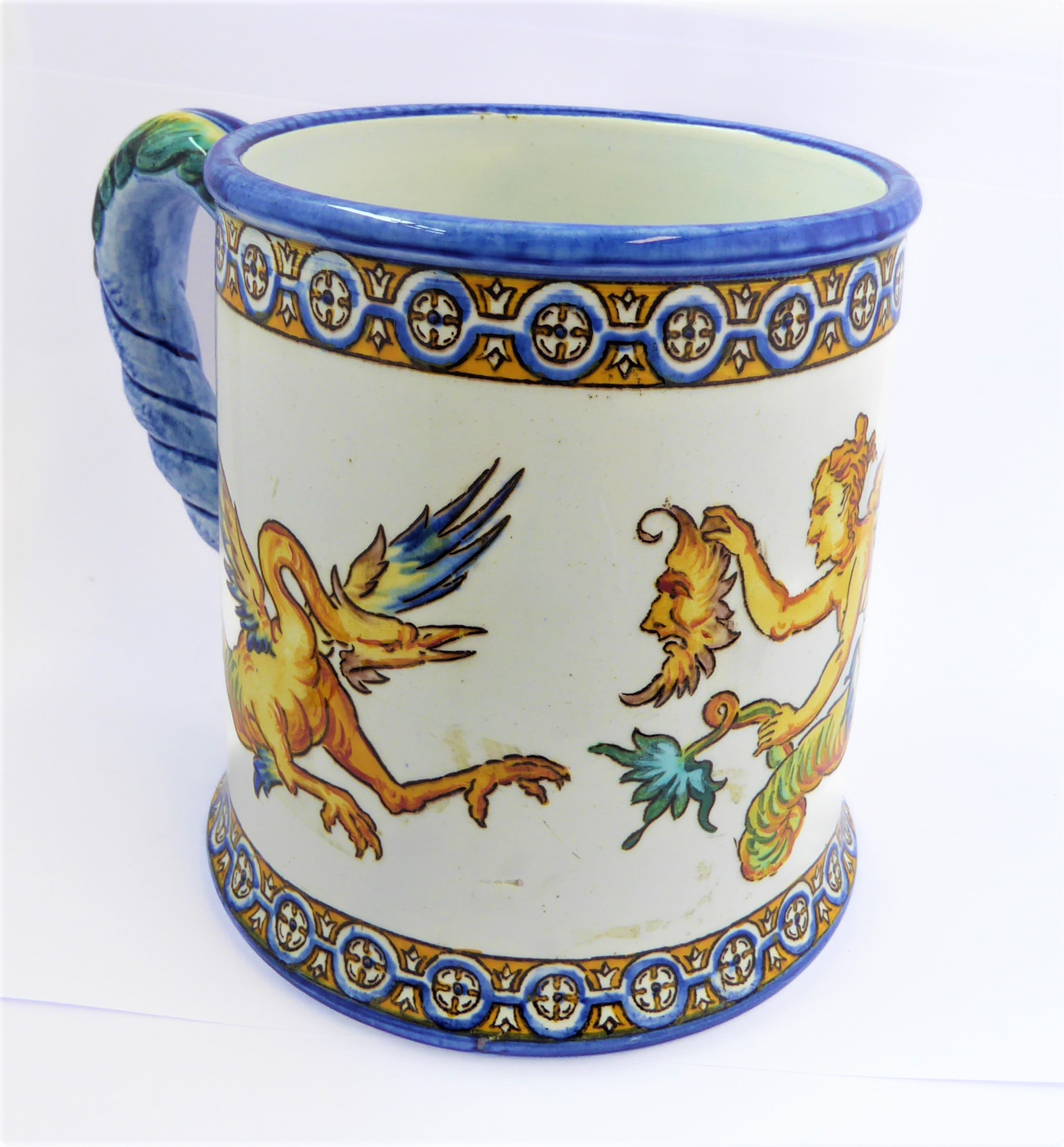A 19th century faience mug by Gien, bearing mark for 1866 (10.5 cm high).  (See p13  'Faience de - Image 4 of 7