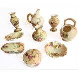 Nine pieces of late 19th and early 20th century Royal Worcester blush porcelain: two urn-shaped