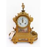 A 19th century gilt-metal and porcelain mounted eight-day mantle clock: the winged cherub surmount