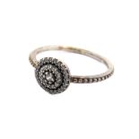 A genuine Pandora silver ring: centrally mounted with concentric circles mounted with small hand-cut