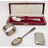 Four pieces of silverware: a cased double-struck King's Pattern teaspoon; a smaller double-struck