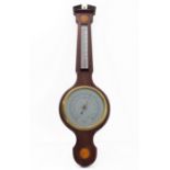 A modern wall barometer in 19th century style with two marquetry inlaid paterae and the silvered