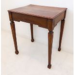 A late 19th to early 20th century oak side table: the slightly overhanging moulded top above