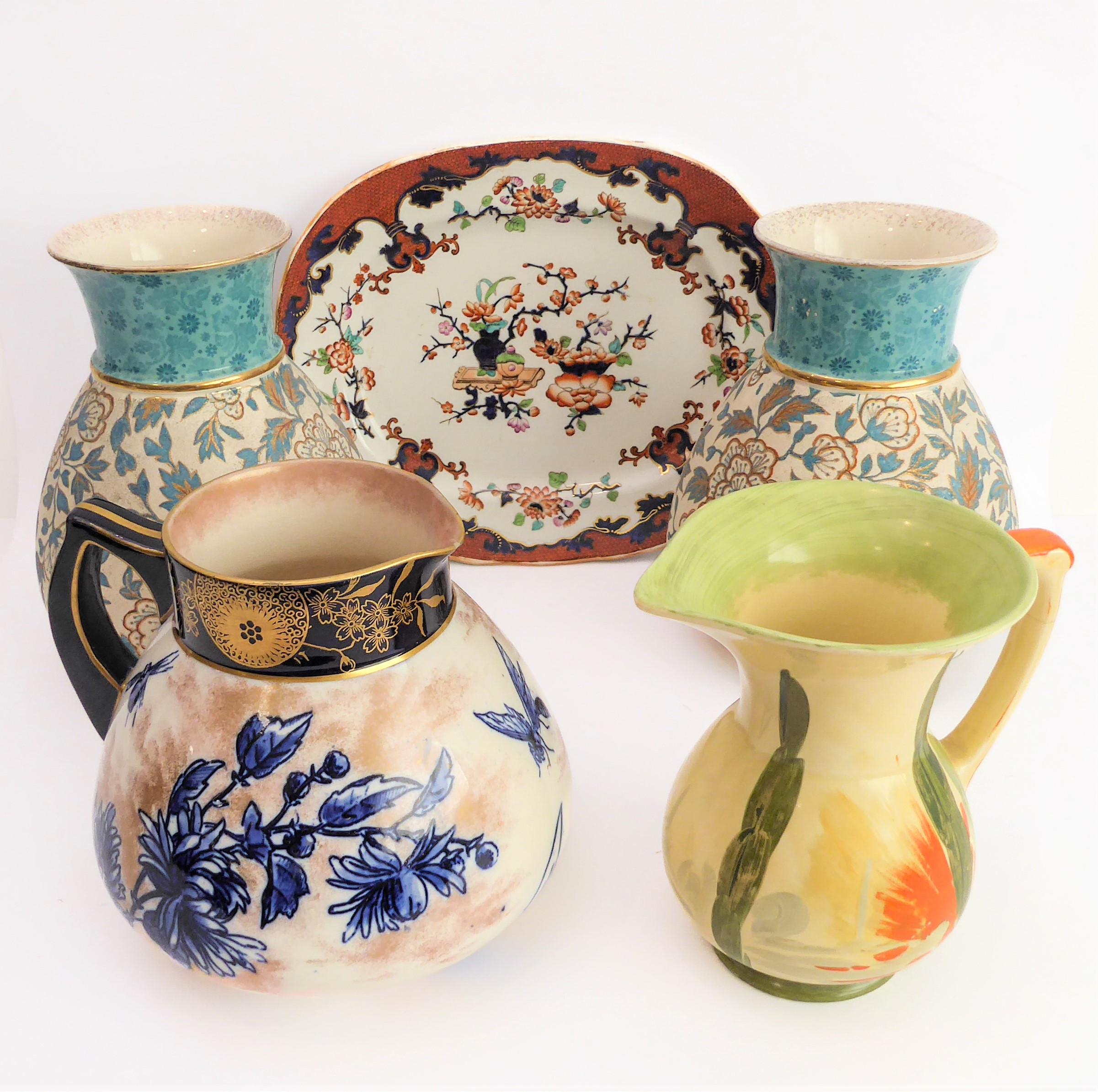 Five ceramics items: a pair of Crown Albion ceramic vases decorated and gilded with flowers