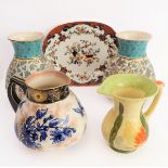 Five ceramics items: a pair of Crown Albion ceramic vases decorated and gilded with flowers