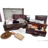 Suitcases containing a variety of interesting mid 20th century collectibles and bygones to