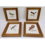 A set of four gilt-framed ceramic tiles hand-painted with a kingfisher, lapwing, owl and a great