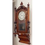 A large 19th century walnut and Tunbridge banded wall-hanging eight-day clock: white-enamel dial
