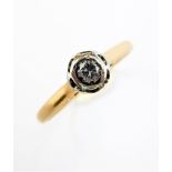 A gold (marks worn) and solitaire diamond ring, size M