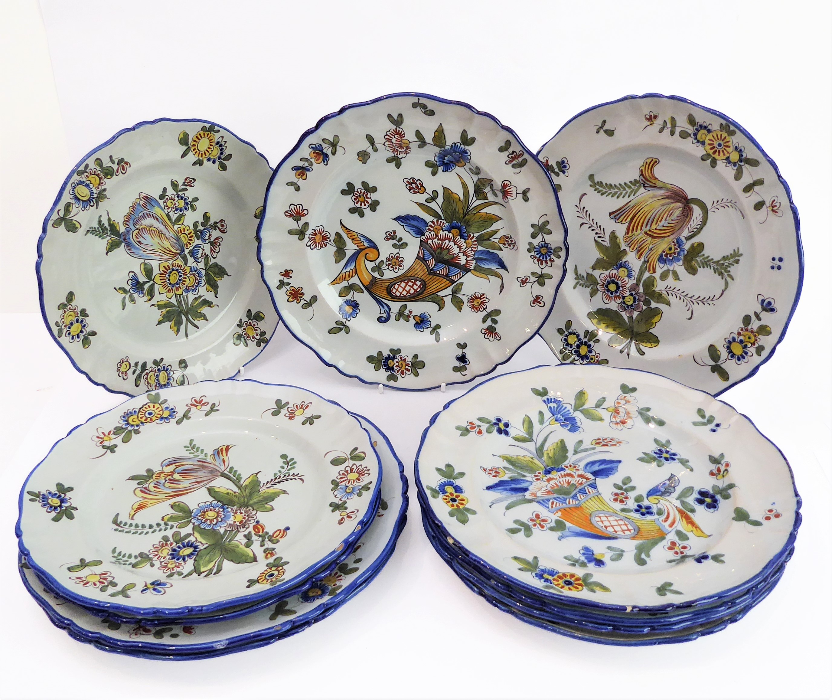 A set of eleven 19th century faience plates by Keller & Guerin at Luneville (early marks). (The