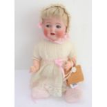 A small bisque head sleeping-eyes doll by Simon & Halbig: impressed marks to back of neck;