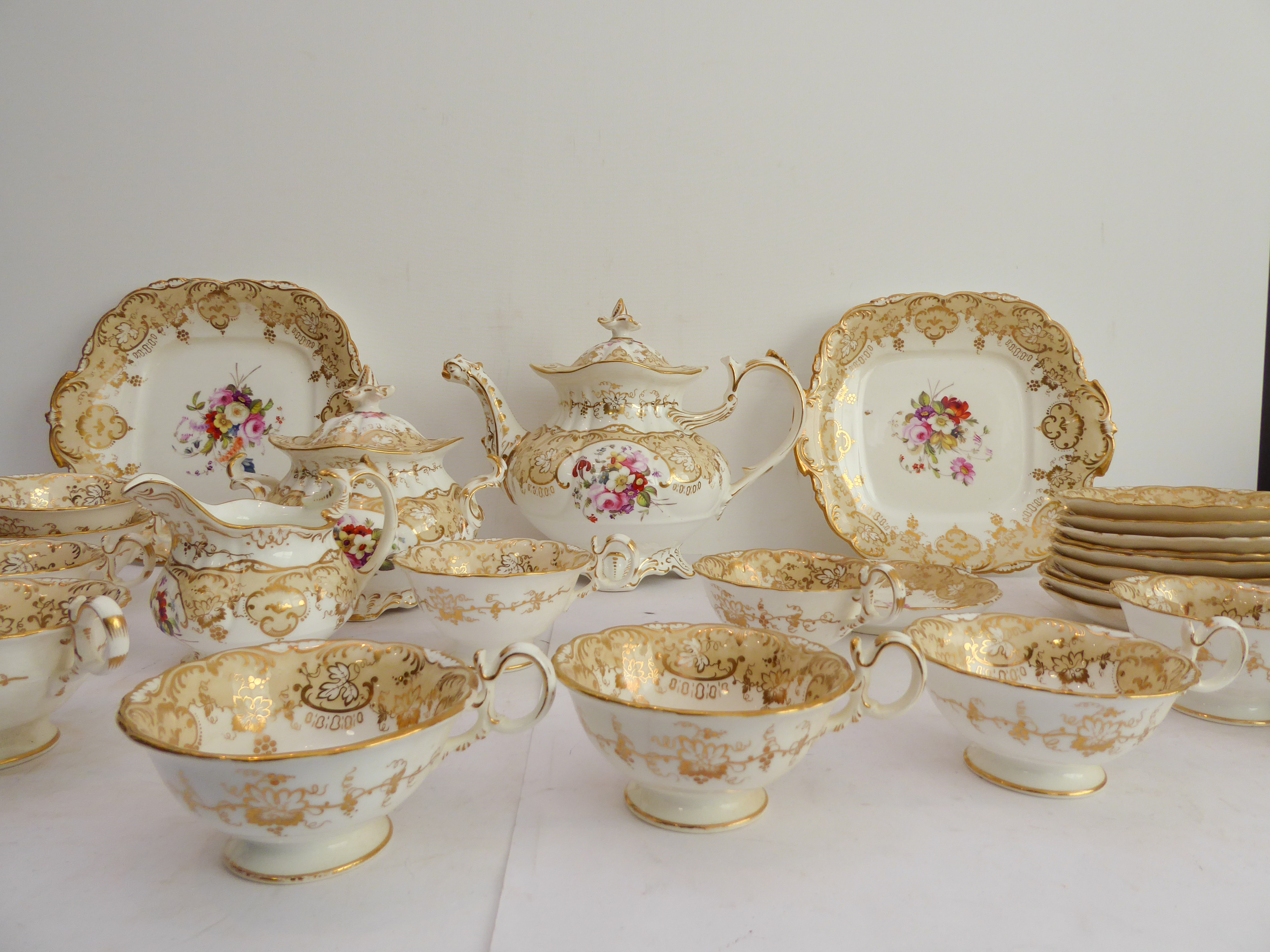 A 19th century ceramic tea service hand-gilded and decorated in enamels with various floral sprays - Image 3 of 3