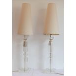 A very stylish pair of modern designer hand-cut glass table lamps: each with elongated and conical