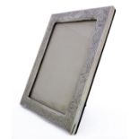 A Chinese silver photograph frame with bamboo decoration and marked 'Sterling Silver - Made in