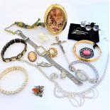 A small quantity of mostly costume jewellery and fashion watches to include: a rolled gold