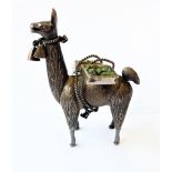 A 'continental' silver (probably Peru) miniature model of a llama carrying two panniers of semi-