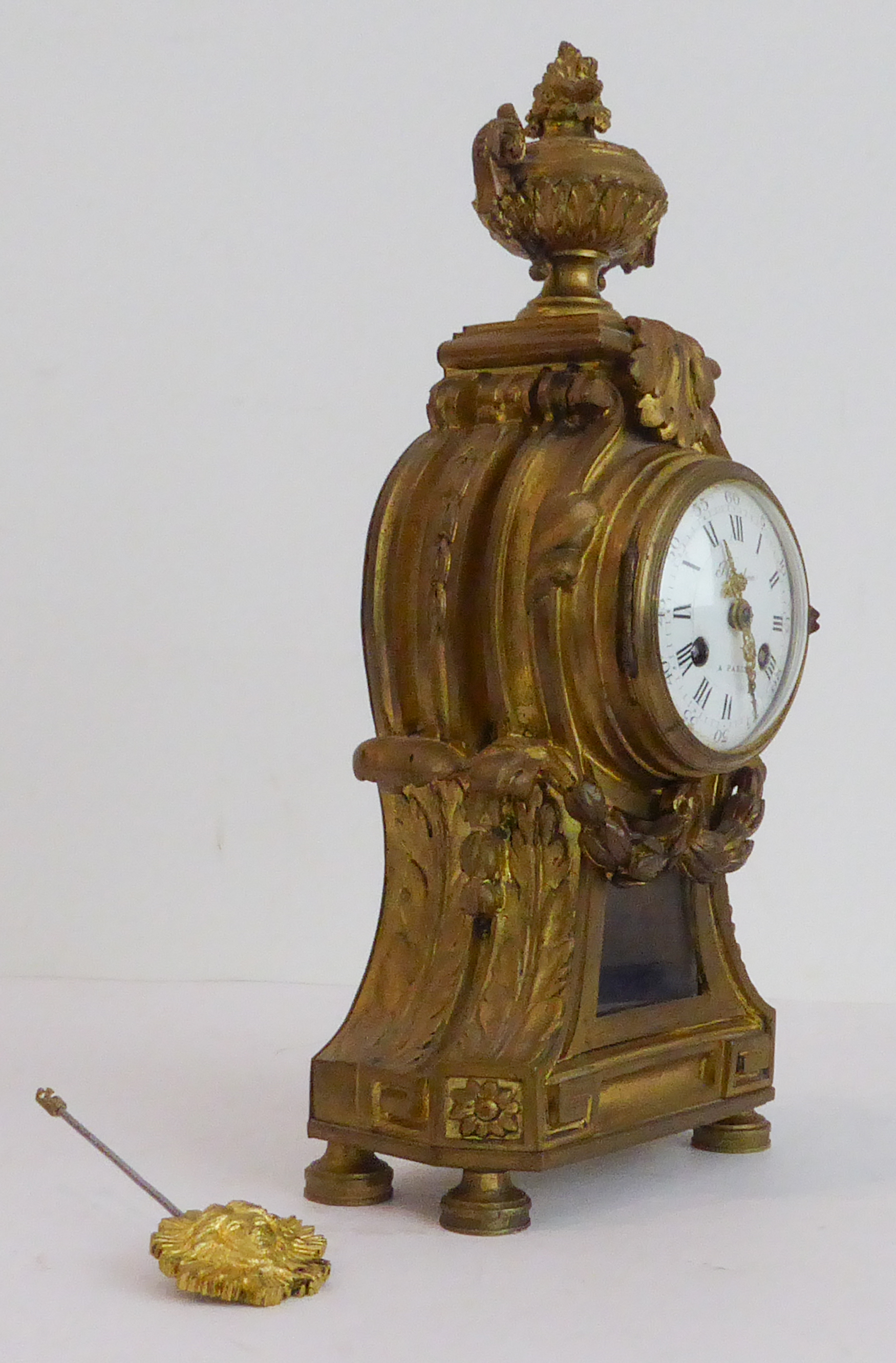 A 19th century French gilt-metal-cased eight-day mantle clock in Louis XVI style. The two-handled - Image 2 of 7