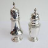 Two hallmarked silver castors (the larger 18cm, total combined weight approx. 239g)