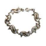 A heavy silver bracelet modelled as intertwined dolphins (18cm)