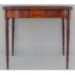 An early 19th century Regency period foldover mahogany tea table: reeded edge top above a central