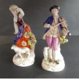 A pair of late 19th century hard-paste hand-decorated porcelain figures: male in 18th century