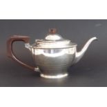 A hallmarked silver teapot with Art Deco geometric octagonal knop finial and similar angular