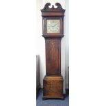 A George III period oak-cased 30-hour longcase clock: the broken swan-neck pediment above a 12-