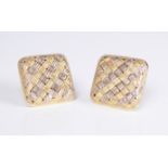 A pair of 18ct two colour gold earrings: marked '750', square with woven chequerboard style