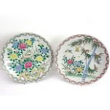 A large pair of Chinese circular porcelain chargers: hand-decorated in enamels with peony and a