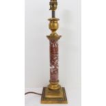 A brass and rouge variegated marble table-lamp as a classical-style column (42.5 cm including