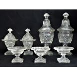 Seven pieces: 1. a pair of cut glass covered vases or bonbonnières: probably late 19th century, with