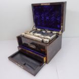 A fine quality late 19th century Asprey coromandel vanity case: the hinged lid with inlaid and