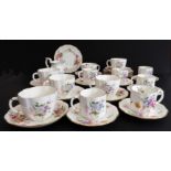 A Royal Crown Derby 'Derby Posies' six-place service comprising tea and coffee cups and saucers,