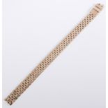 A 9-carat yellow gold flexible mesh-link bracelet with bark textured finish, hallmark rubbed (17.