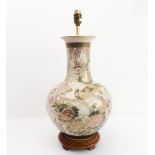 A large modern Japanese-style table lamp: hand-gilded and decorated with an exotic bird amongst