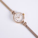 A 9ct gold ladies manual wind wrist watch by Vertex: the Dennison case hallmarked Birmingham 1953,