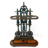 A 19th century cast urn stick stand: stylised floral cast decoration and with original drop-in