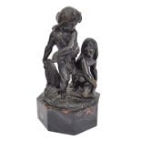 An Art Deco period patinated bronze sculpture: standing child with a headband of lily leaves holding