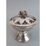 An Arts & Crafts style hallmarked silver pedestal rose style bowl: the cover with rose finial