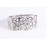 A platinum/white gold ring (unmarked): set with two bands of four horizontal diamonds, ring size I/