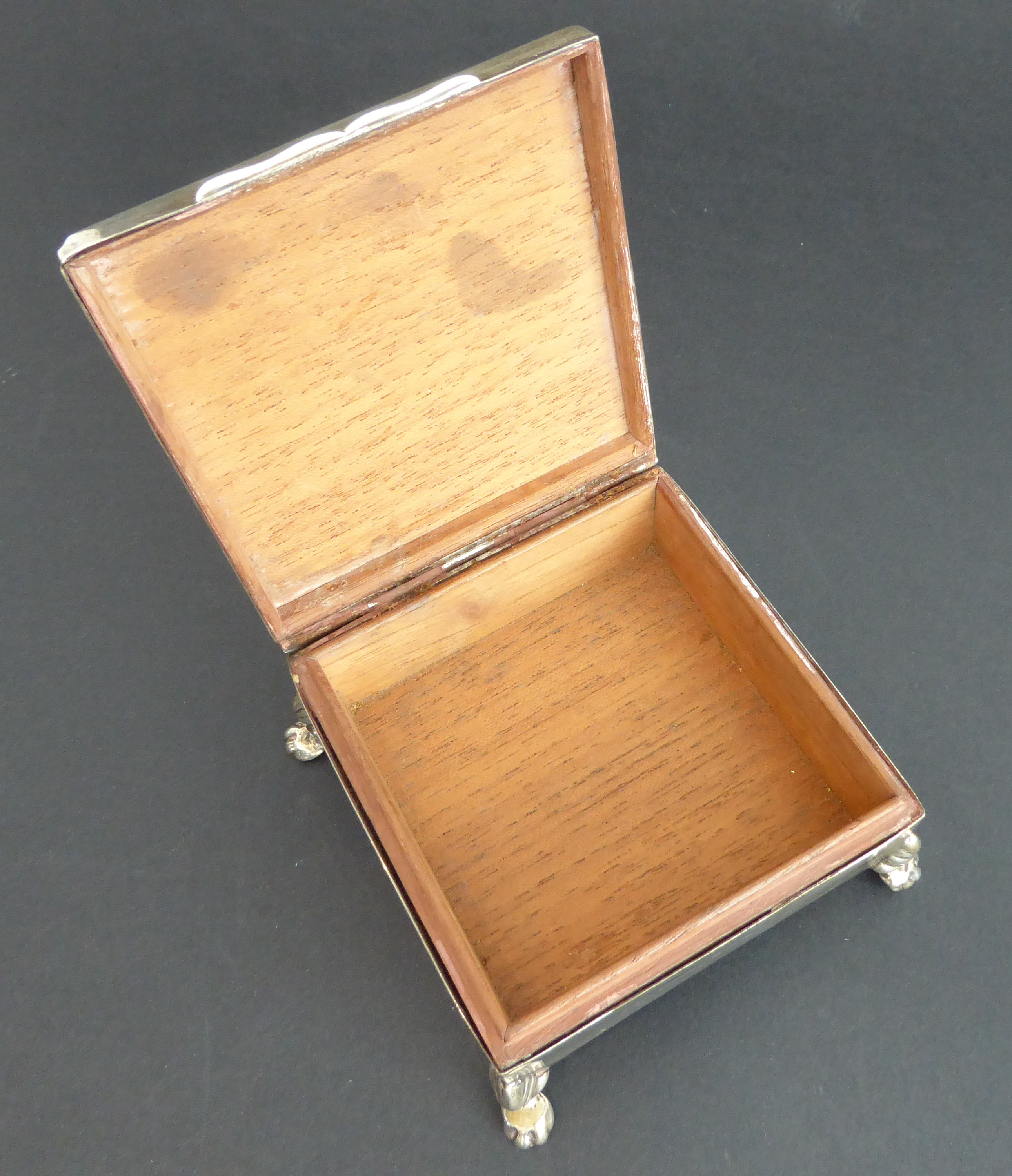 A hallmarked silver cedar-lined cigarette box: square form and raised on four animal's paw style - Image 2 of 6