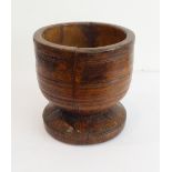 A heavy early-style turned hardwood bowl of good patination and turned in the form of a wassail