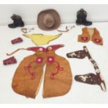 An unusual mid-20th century child's cowboy costume to include: hat, leather waistcoat and leather